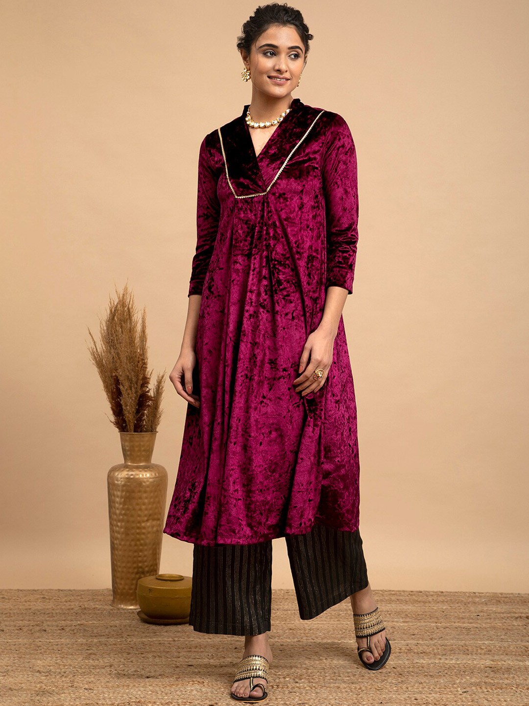 

Pink Fort Women Burgundy Velvet Kurta with Palazzos