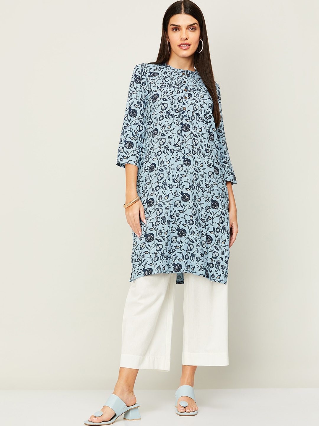 

Melange by Lifestyle Keyhole Neck Three-Quarter Sleeves Quirky Printed Kurta, Blue