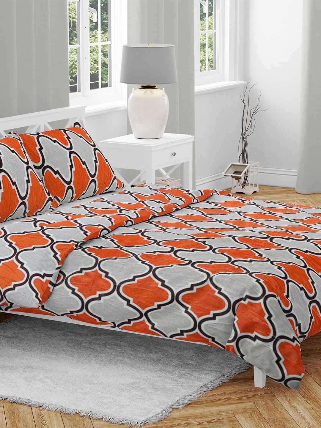 

AAZEEM Orange & Black Geometric Printed 210 TC Queen Bedsheet with 2 Pillow Covers