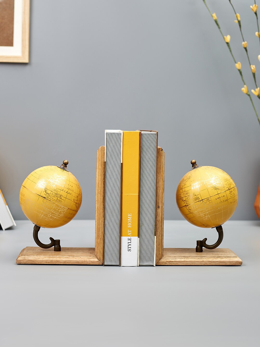 

HomeTown Venice Set Of 2 Mustard Yellow Bookend Globe Showpiece