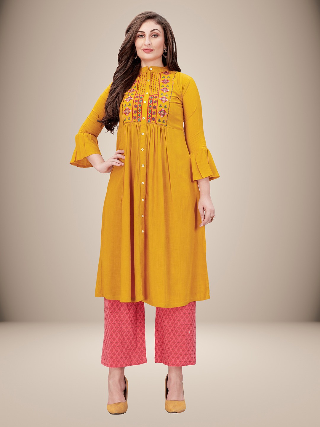 

Sarvayog Fashion Women Yellow Floral Embroidered Flared Sleeves Kurta