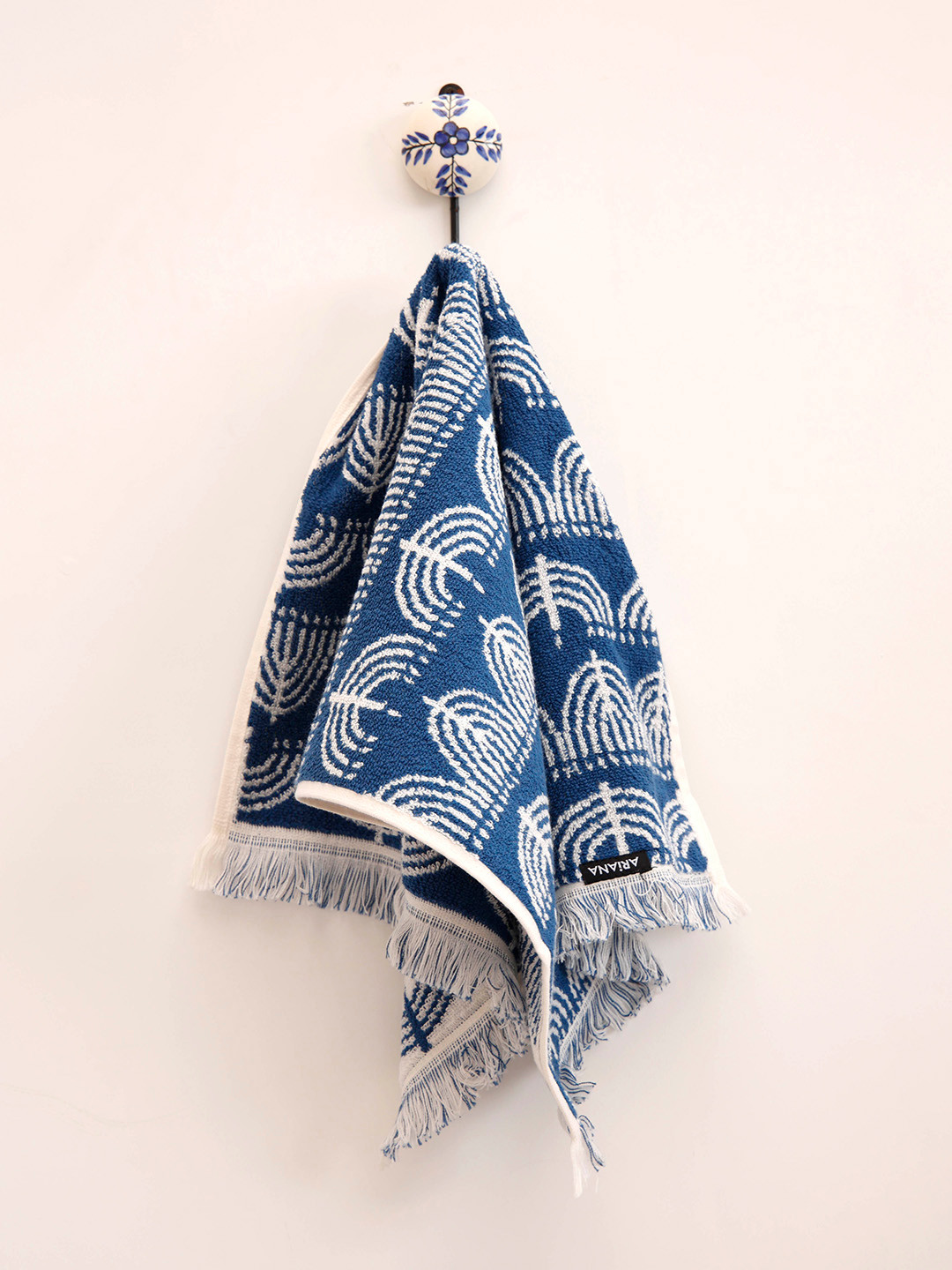 

Ariana Navy Blue & White Printed Soft High Absorbent 500 GSM Cotton Hand Towel