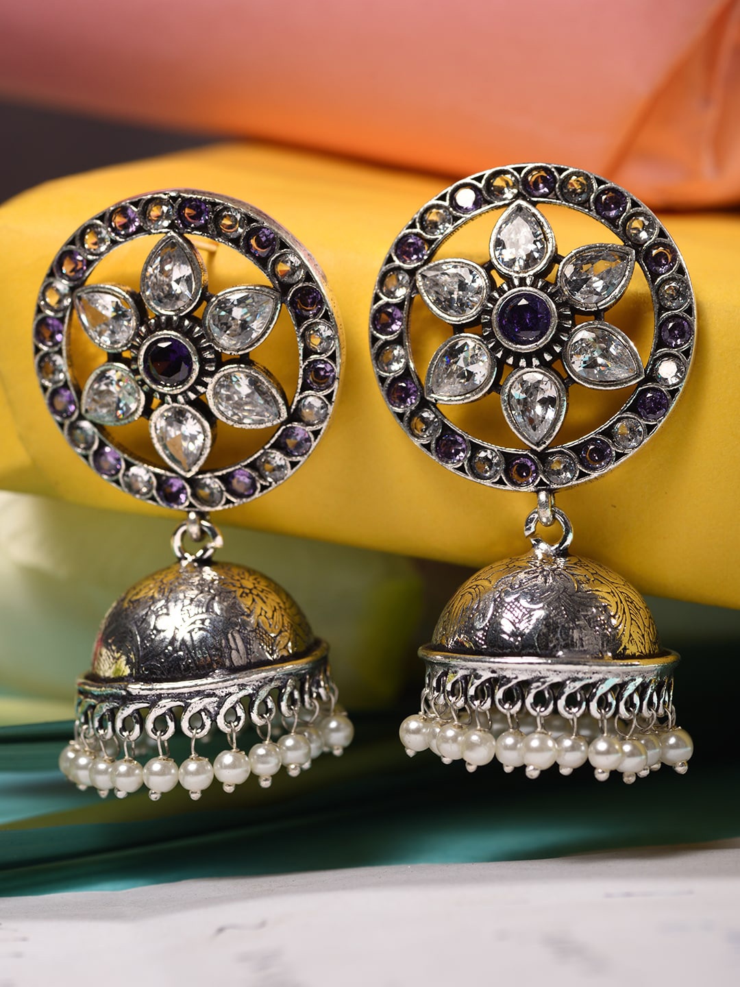 

Saraf RS Jewellery White Contemporary Jhumkas Earrings