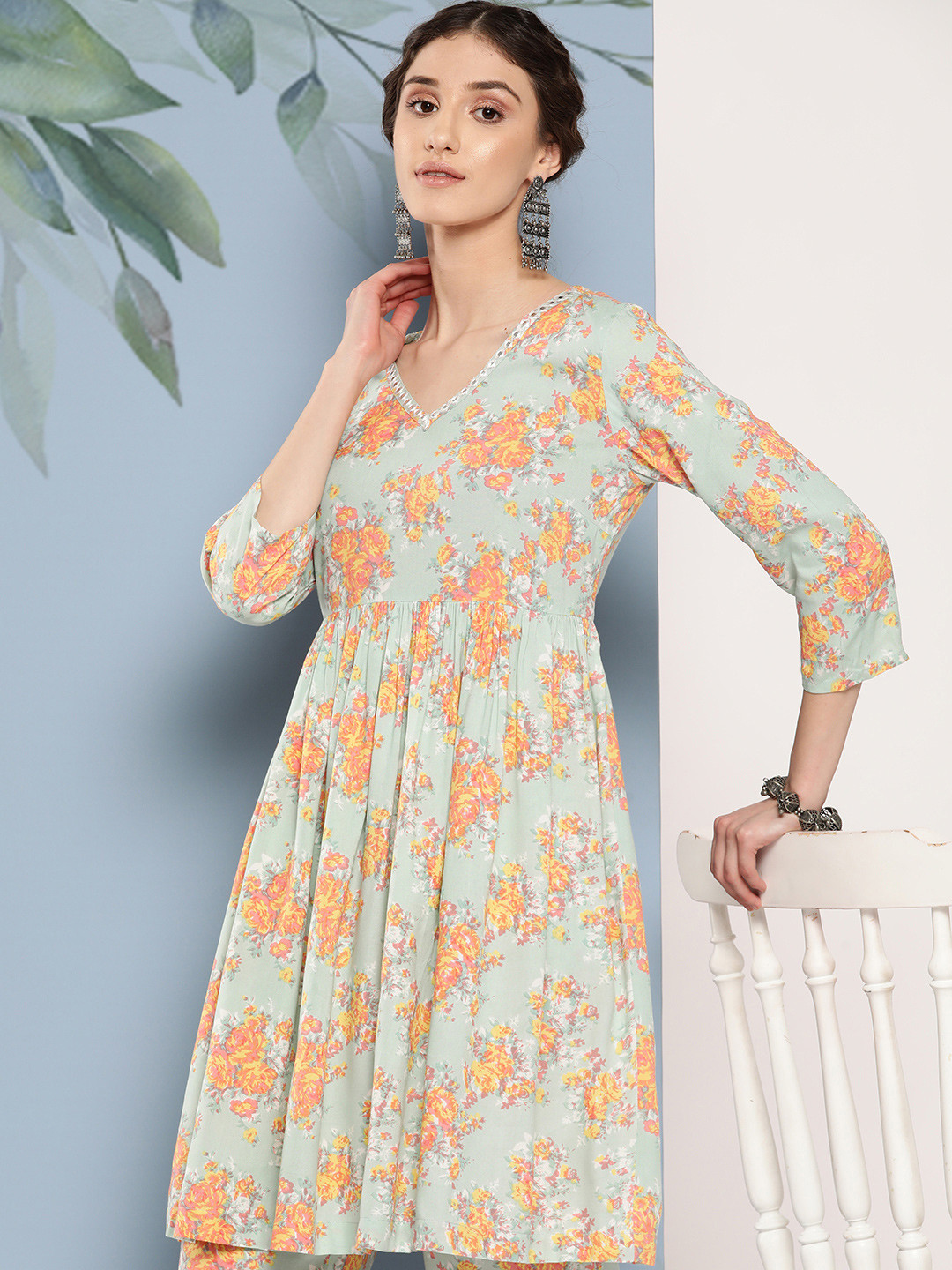 

Sangria Women Floral Printed Pleated Mirror Work Kurta with Palazzos, Blue