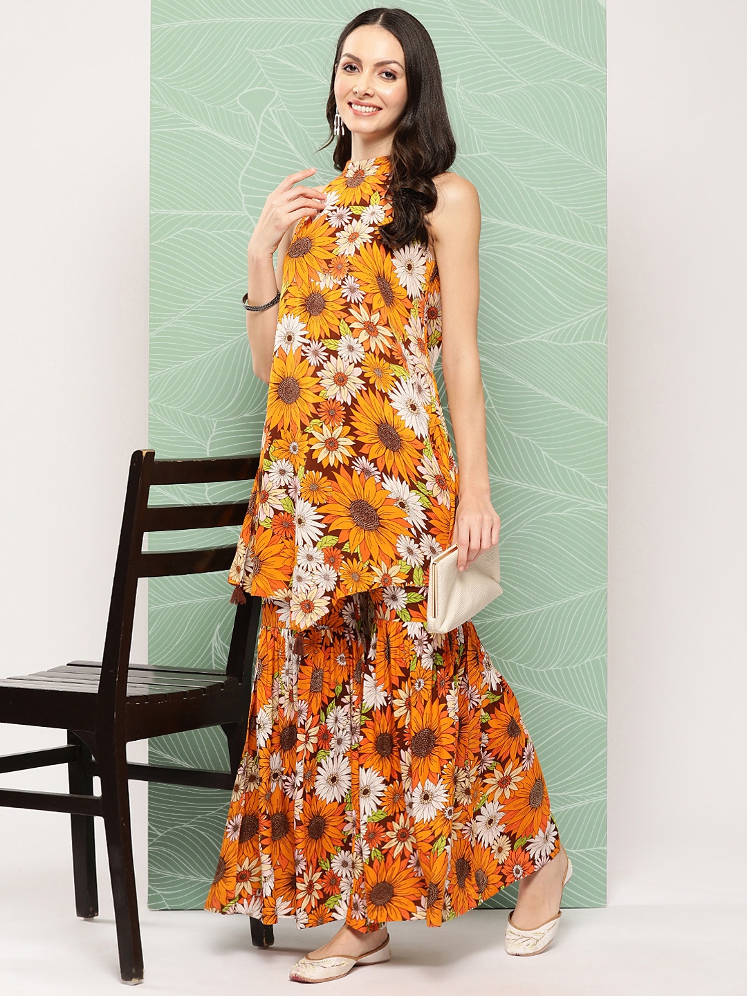 

Sangria Women Floral Printed Regular Kurta with Sharara, Mustard