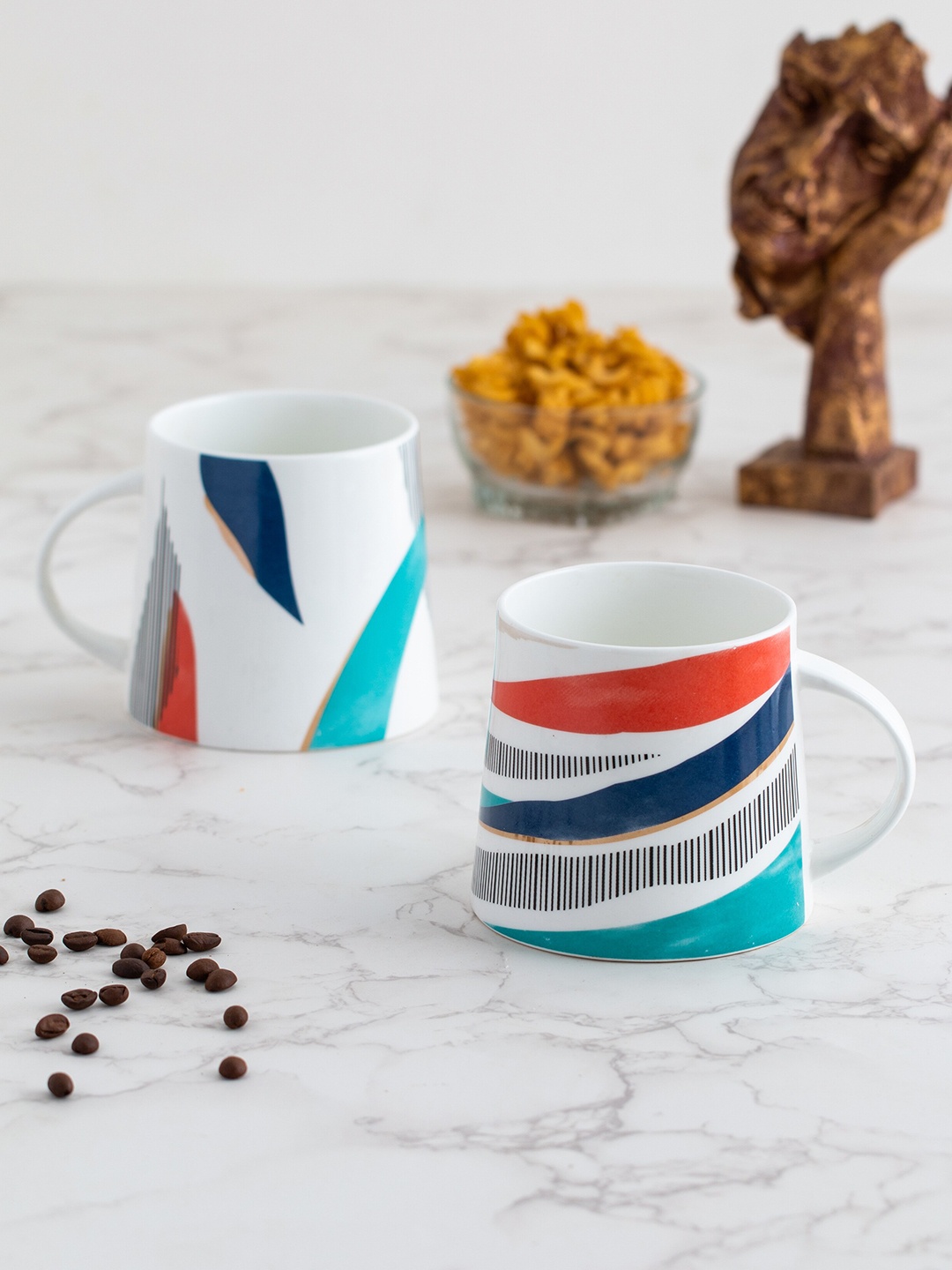 

JCPL Fine Ceramic White & Turquoise Blue 2 Pieces Geometric Printed Glossy Mugs 350 Ml