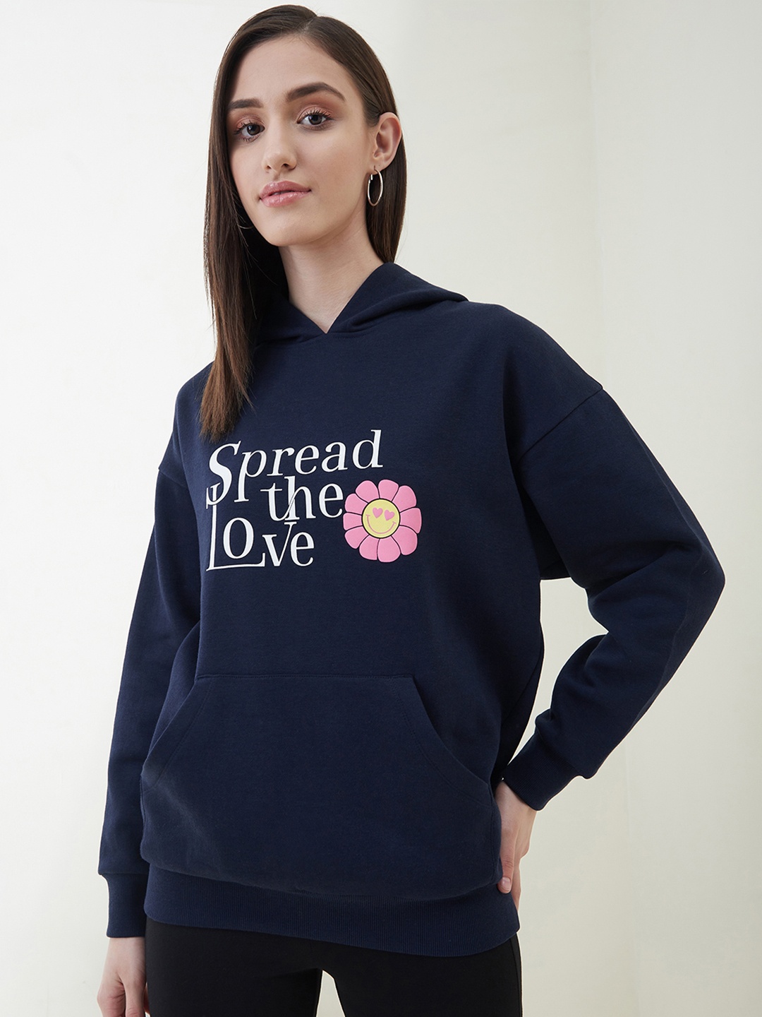 

Femella Women Navy Blue Printed Hooded Sweatshirt