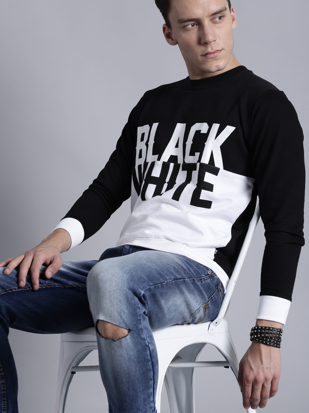 

Kook N Keech Men Black & White Printed Sweatshirt