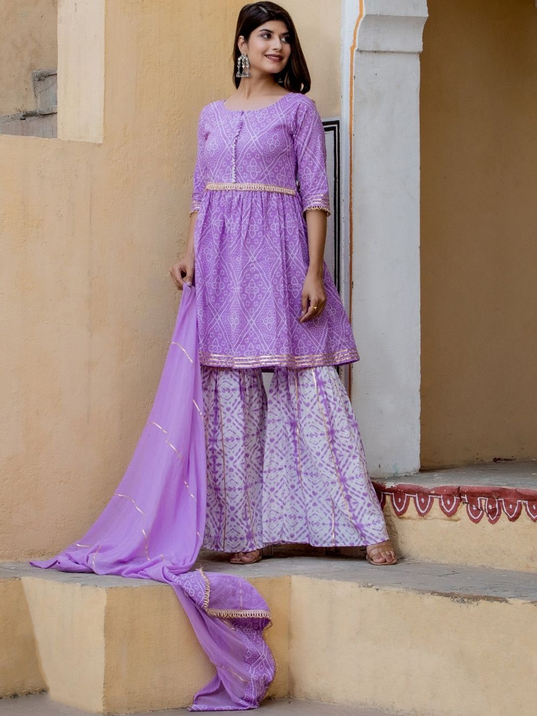 

HOUSE OF JAMOTI Women Bandhani Printed Pleated Kurta with Sharara & Dupatta, Lavender