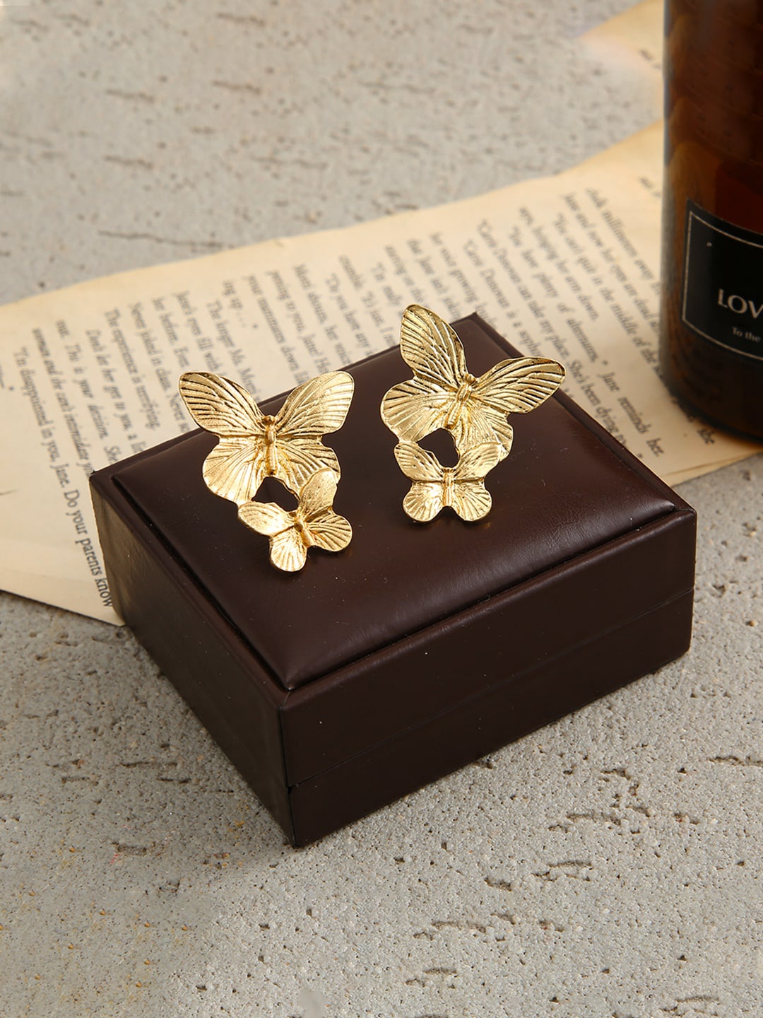 

Unwind by Yellow Chimes Gold-Plated Contemporary Studs Earrings