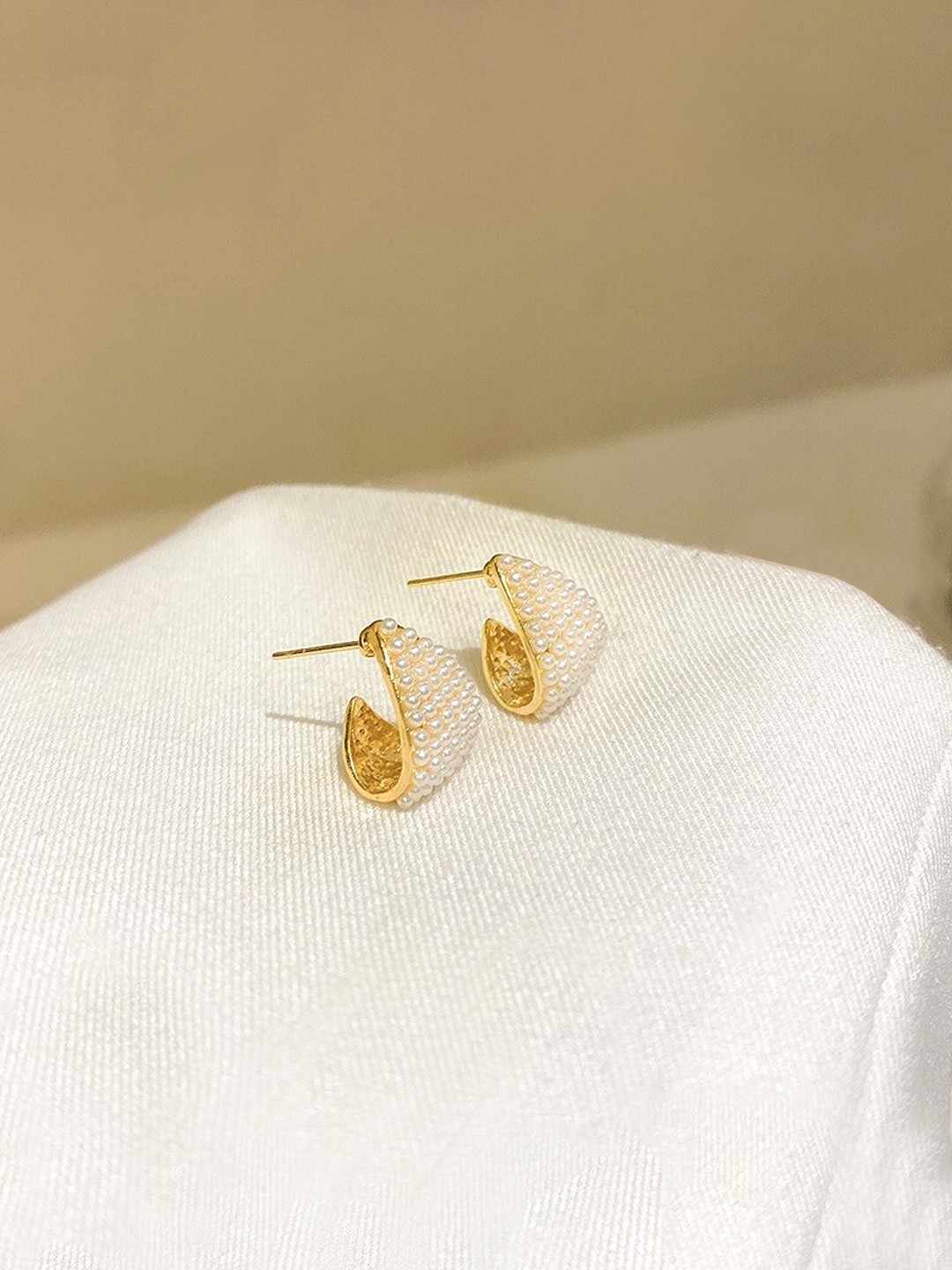 

Unwind by Yellow Chimes Gold-Plated Pearl Studded Contemporary Ear Cuffs