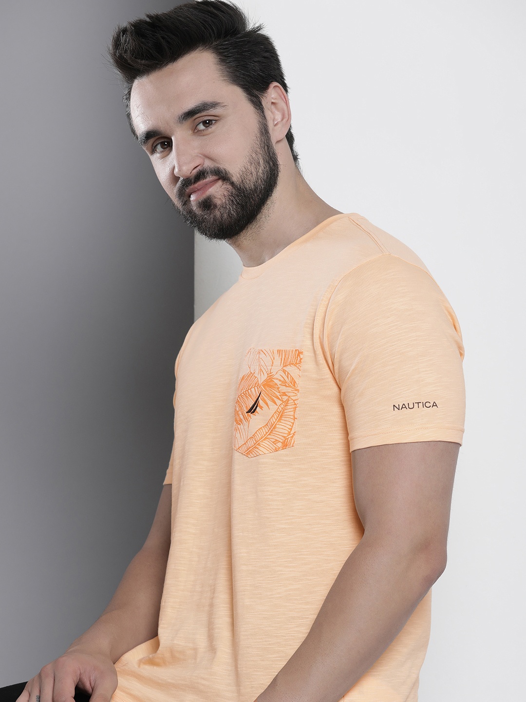 

Nautica Men Pure Cotton Solid With Printed Pocket T-shirt, Orange