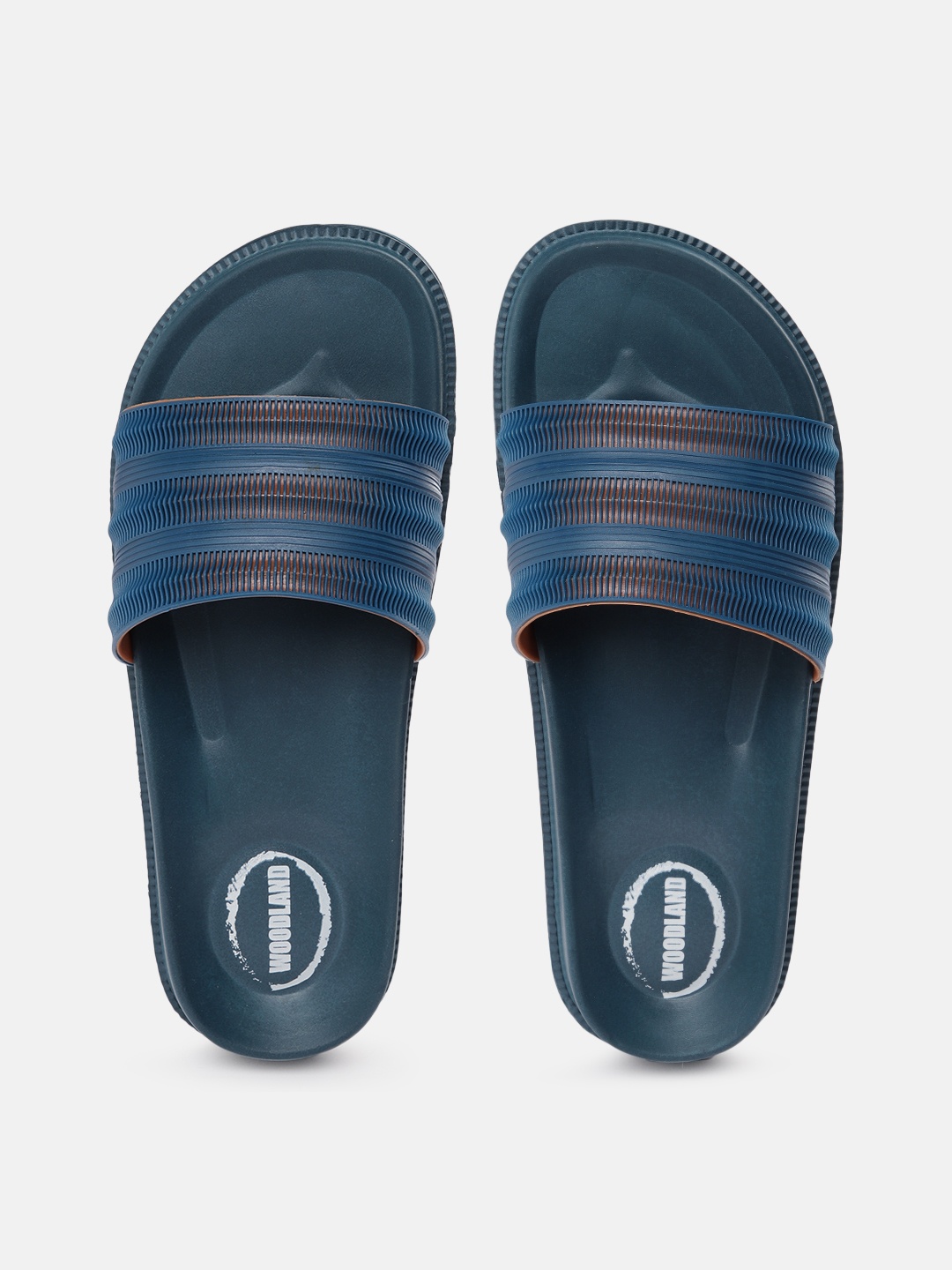 

Woodland Men Self Design Slip-On Flip Flops, Turquoise blue