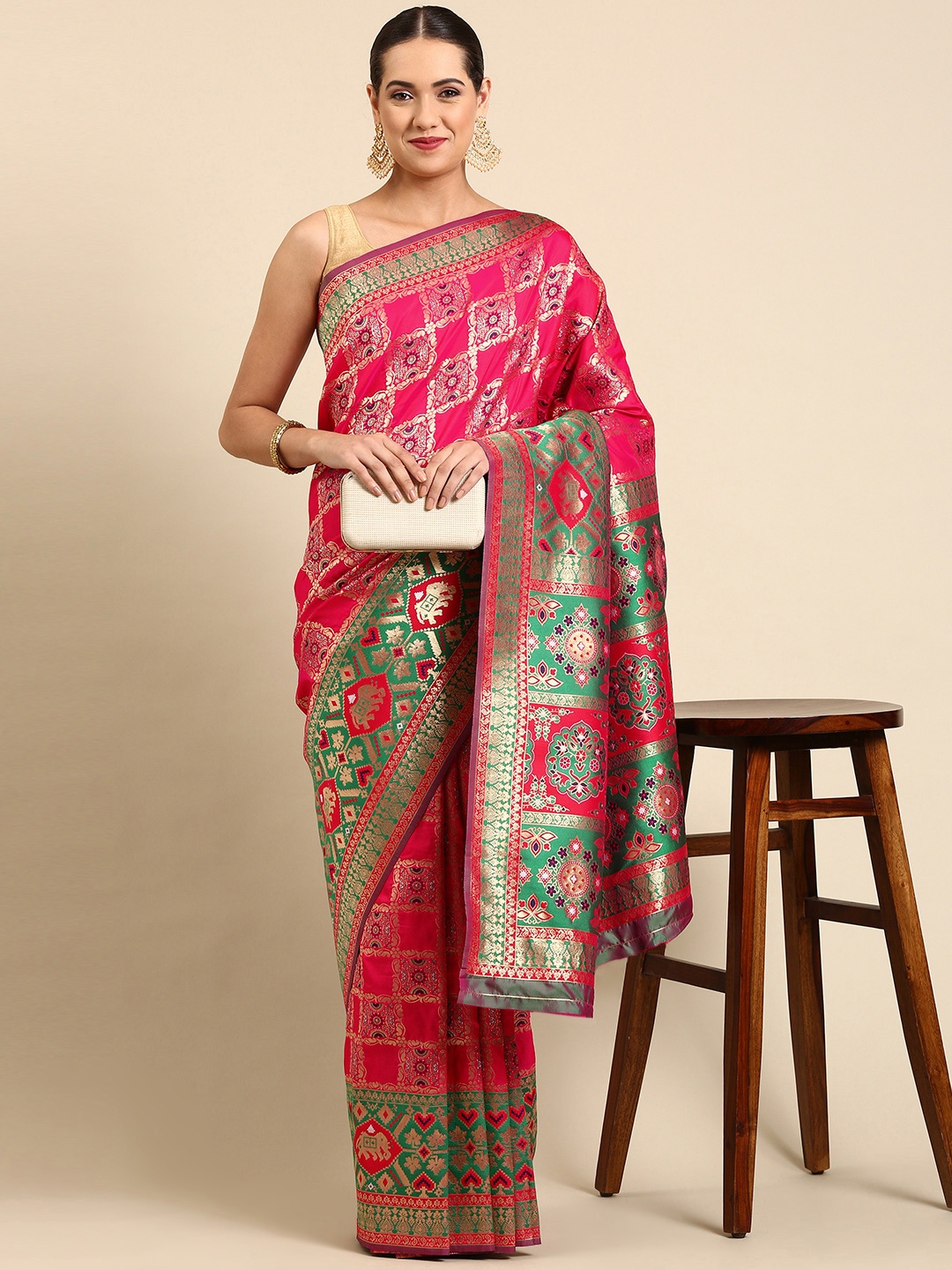 

Mitera Pink & Teal Ethnic Motifs Zari Silk Blend Banarasi Patola Saree