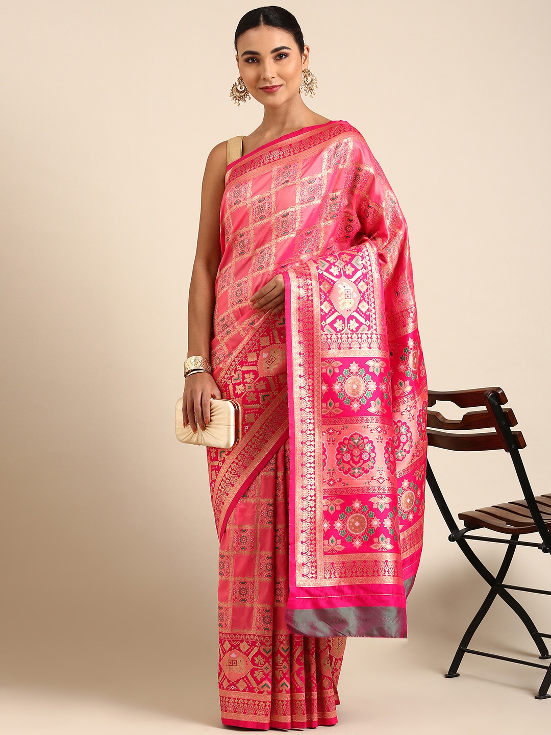 

Mitera Pink & Gold-Toned Ethnic Motifs Zari Silk Blend Banarasi Patola Saree