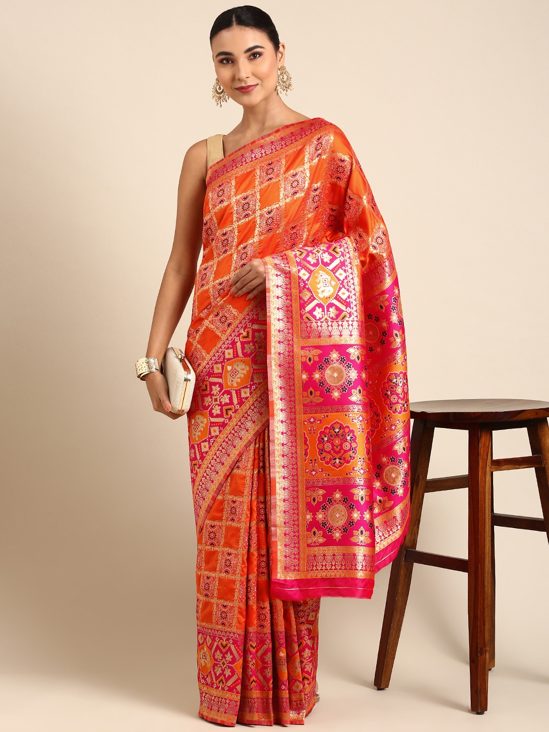 

Mitera Orange & Pink Ethnic Motifs Zari Silk Blend Banarasi Saree