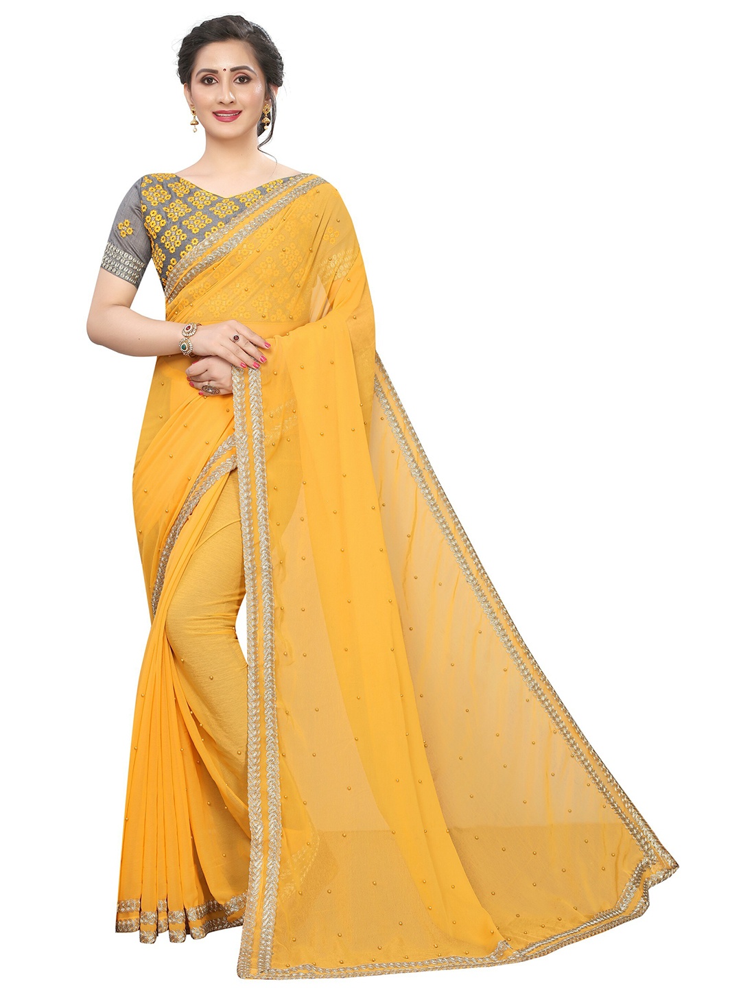 

Vrundavan ethics Embellished Beads and Stones Pure Georgette Saree, Mustard