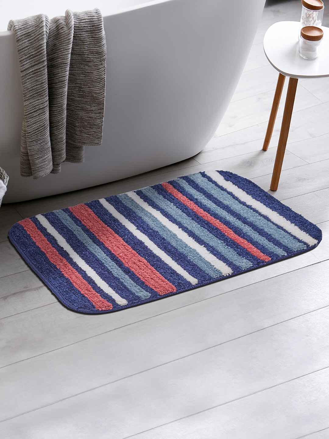 

HomeTown Striped Rectangular Bath Rug, Blue
