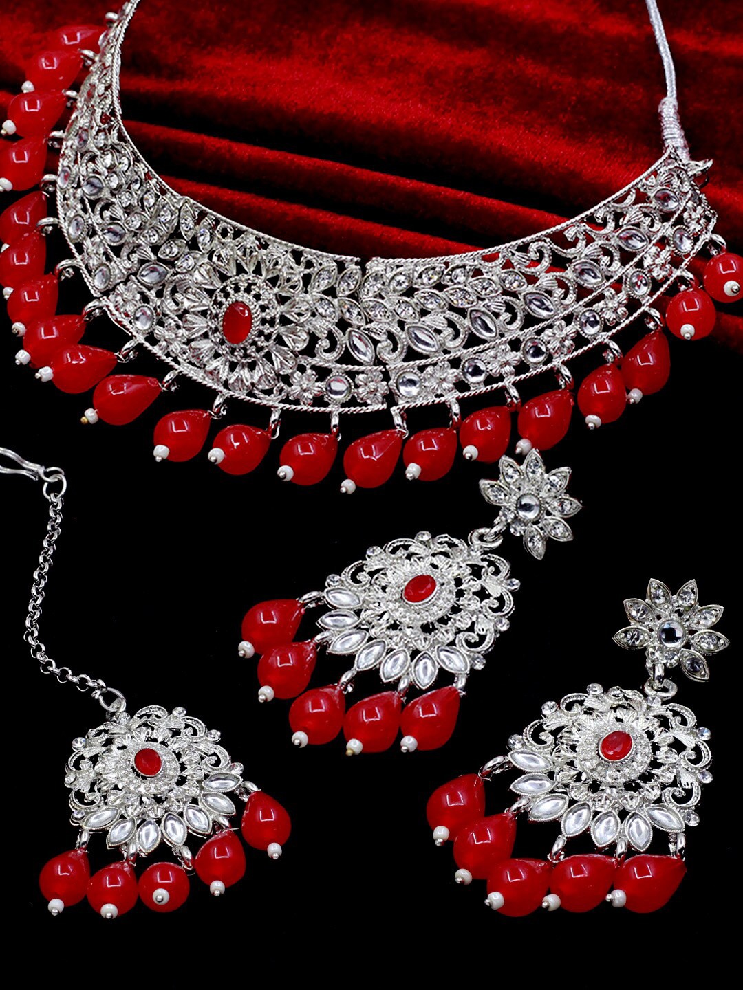 

SAIYONI Women Silver-Plated Kundan Studded & Beaded Jewellery Set, Red