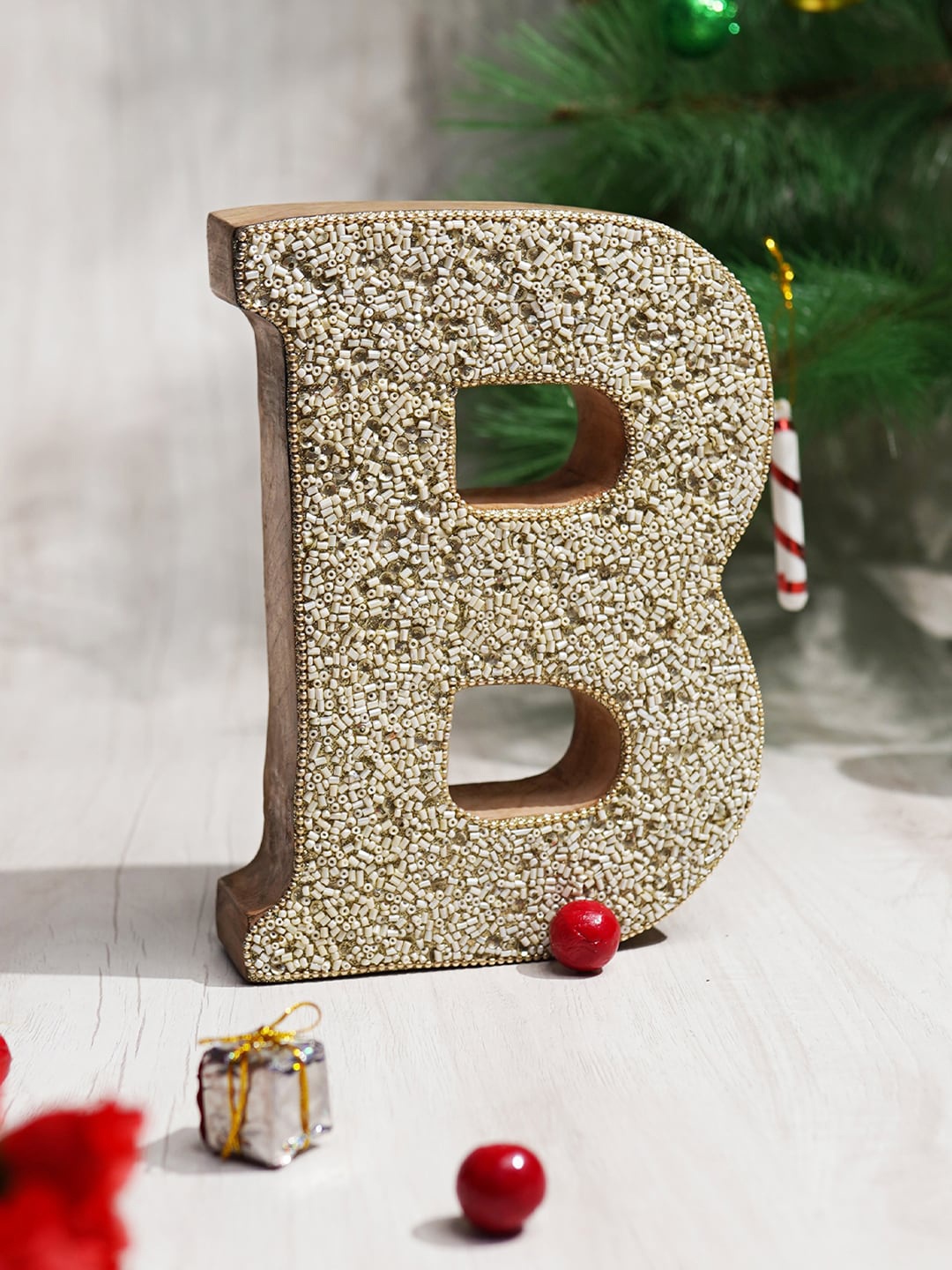 

CASA DECOR Gold-Coloured & White The Beaded Alphabets B Showpiece