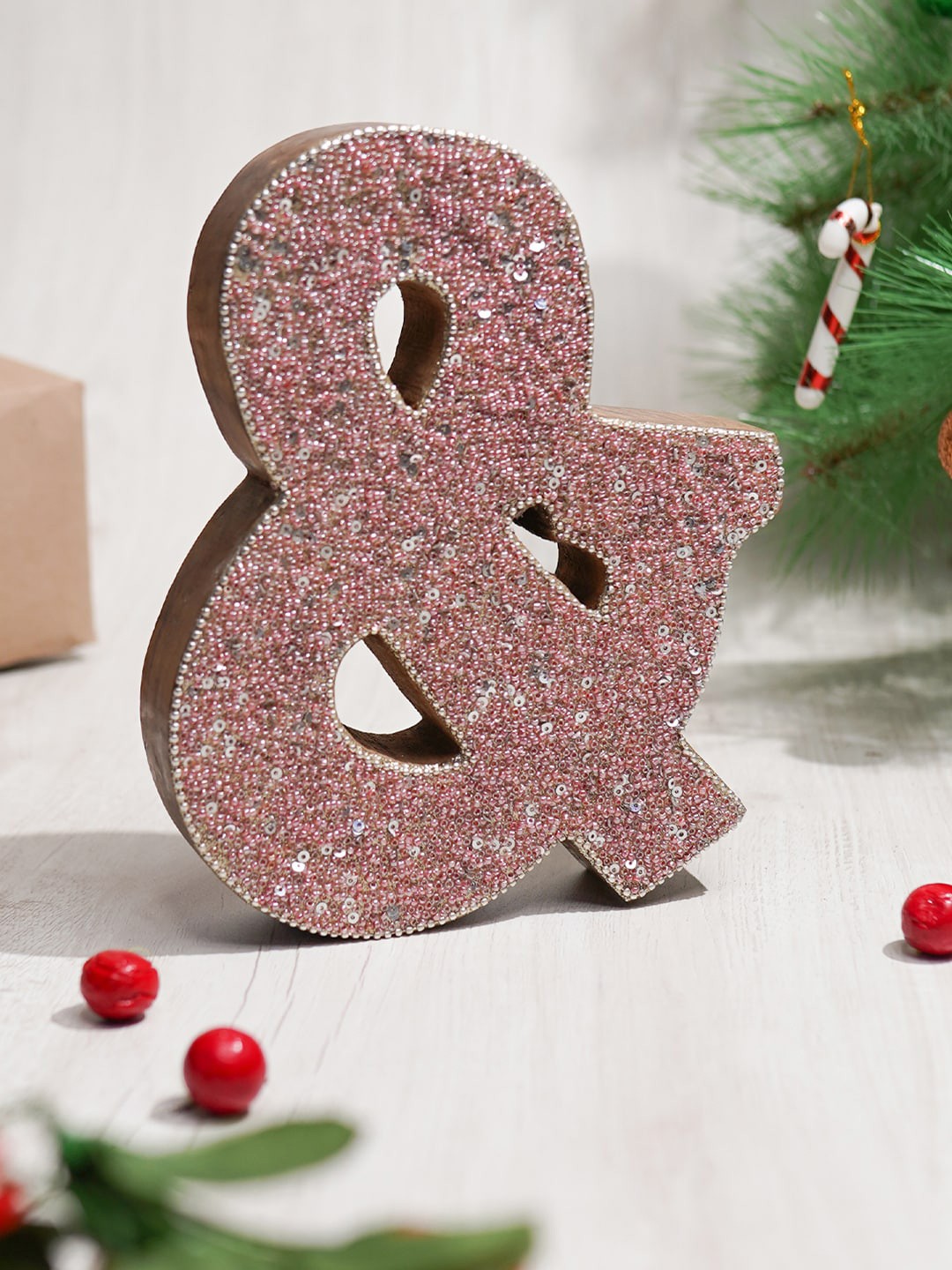 

CASA DECOR Pink & Bead Studded Wooden Showpiece