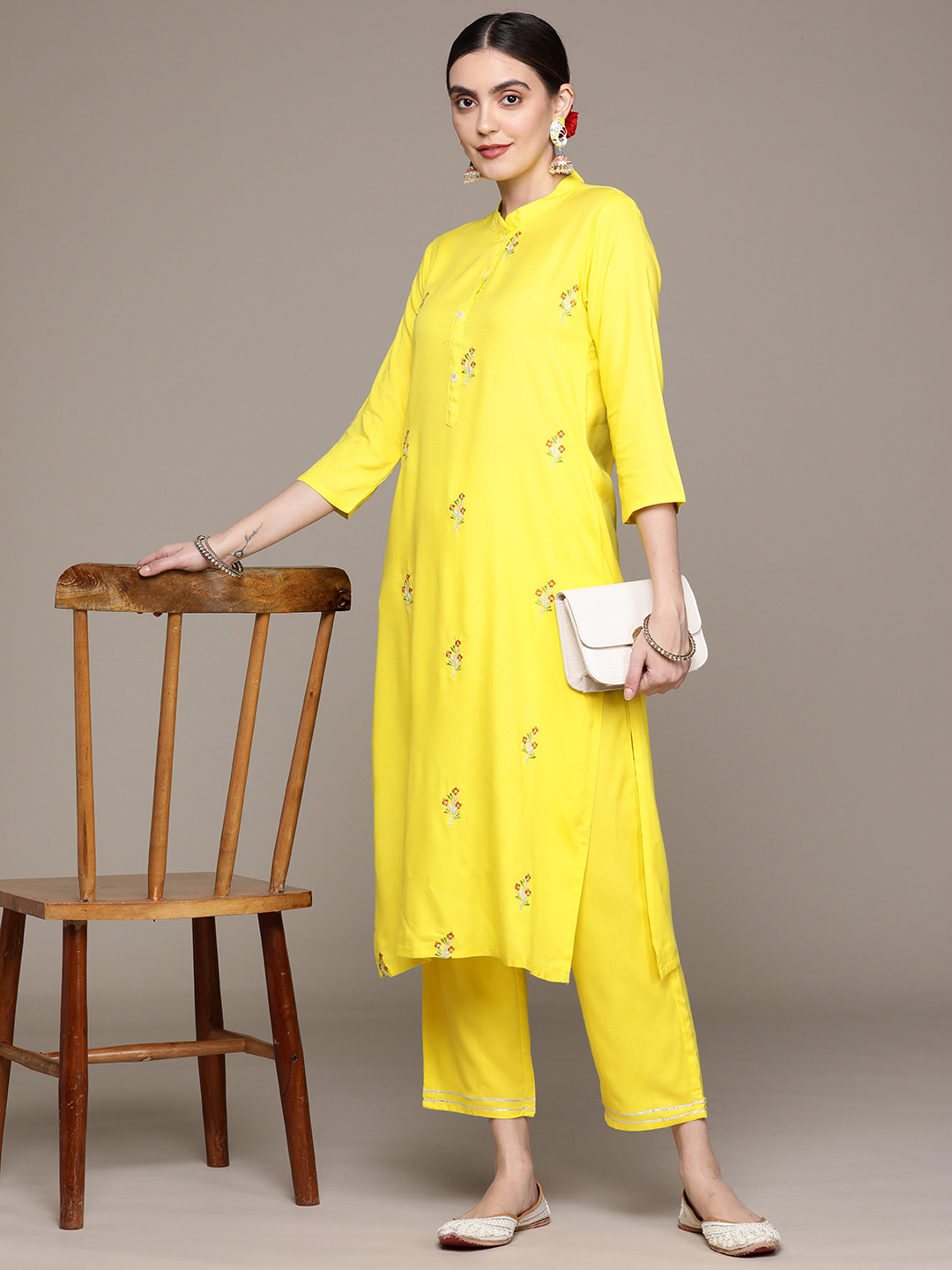 

Anubhutee Women Floral Embroidered Kurta with Trousers, Yellow