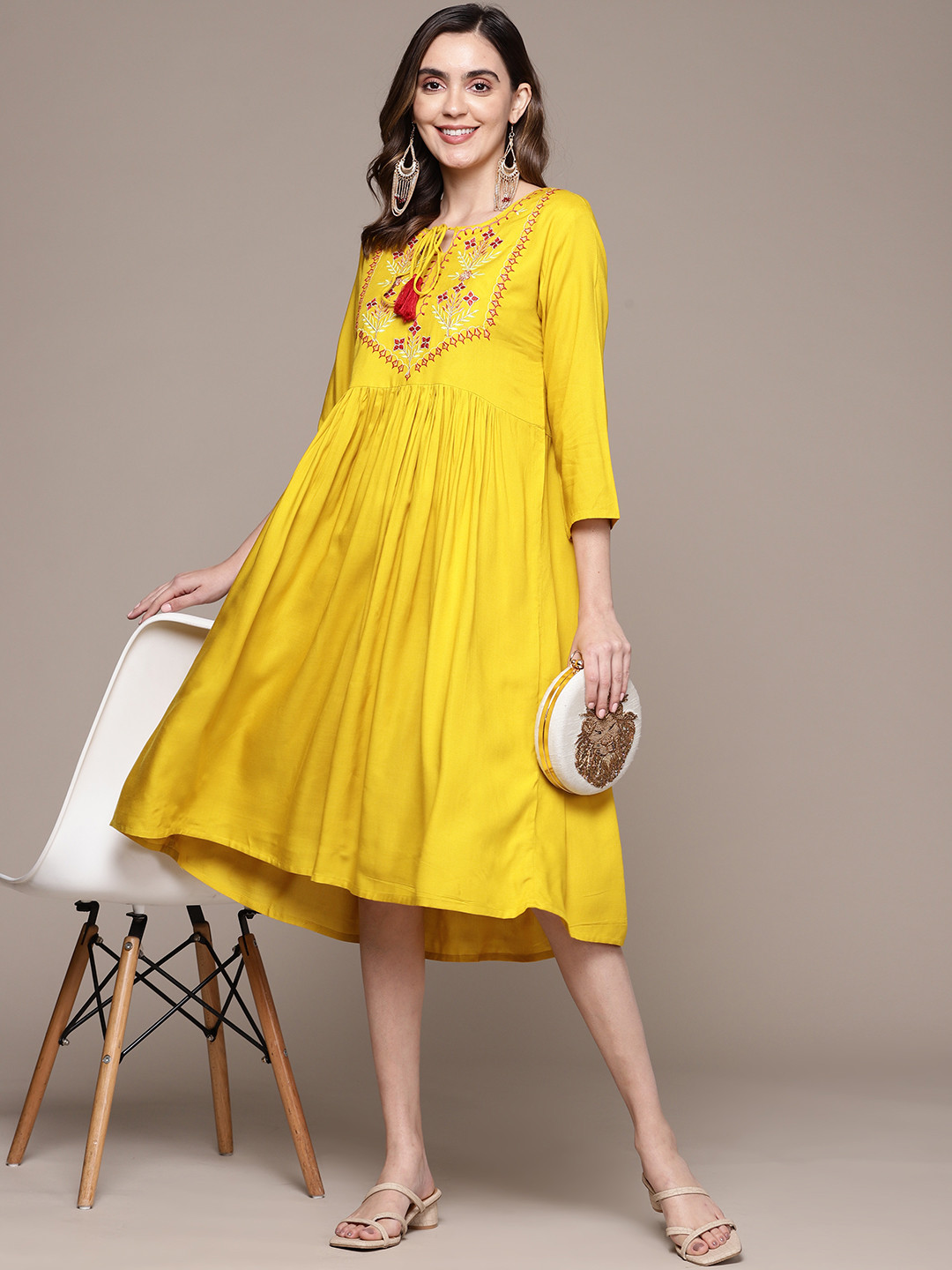 

Anubhutee Floral Embroidered Tie-Up Neck A-Line Dress, Yellow
