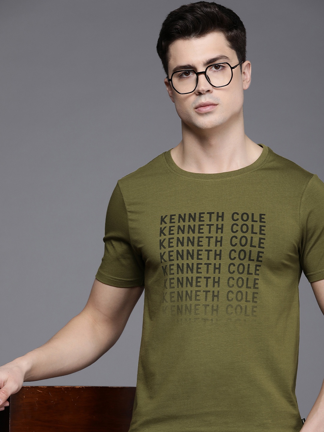 

Kenneth Cole Men Olive Green & Black Brand Logo Printed T-shirt