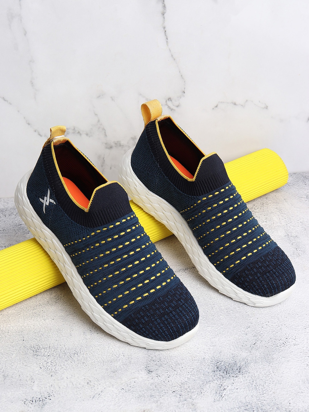 

Carlton London sports Women Woven Design Slip-On Sneakers, Blue