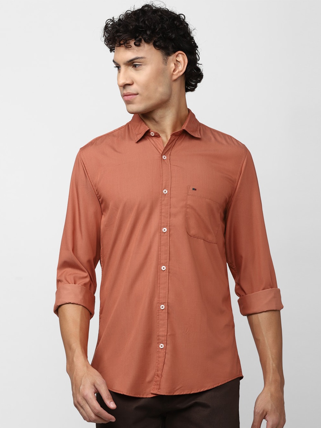 

Peter England Casuals Men Solid Slim Fit Casual Shirt, Orange