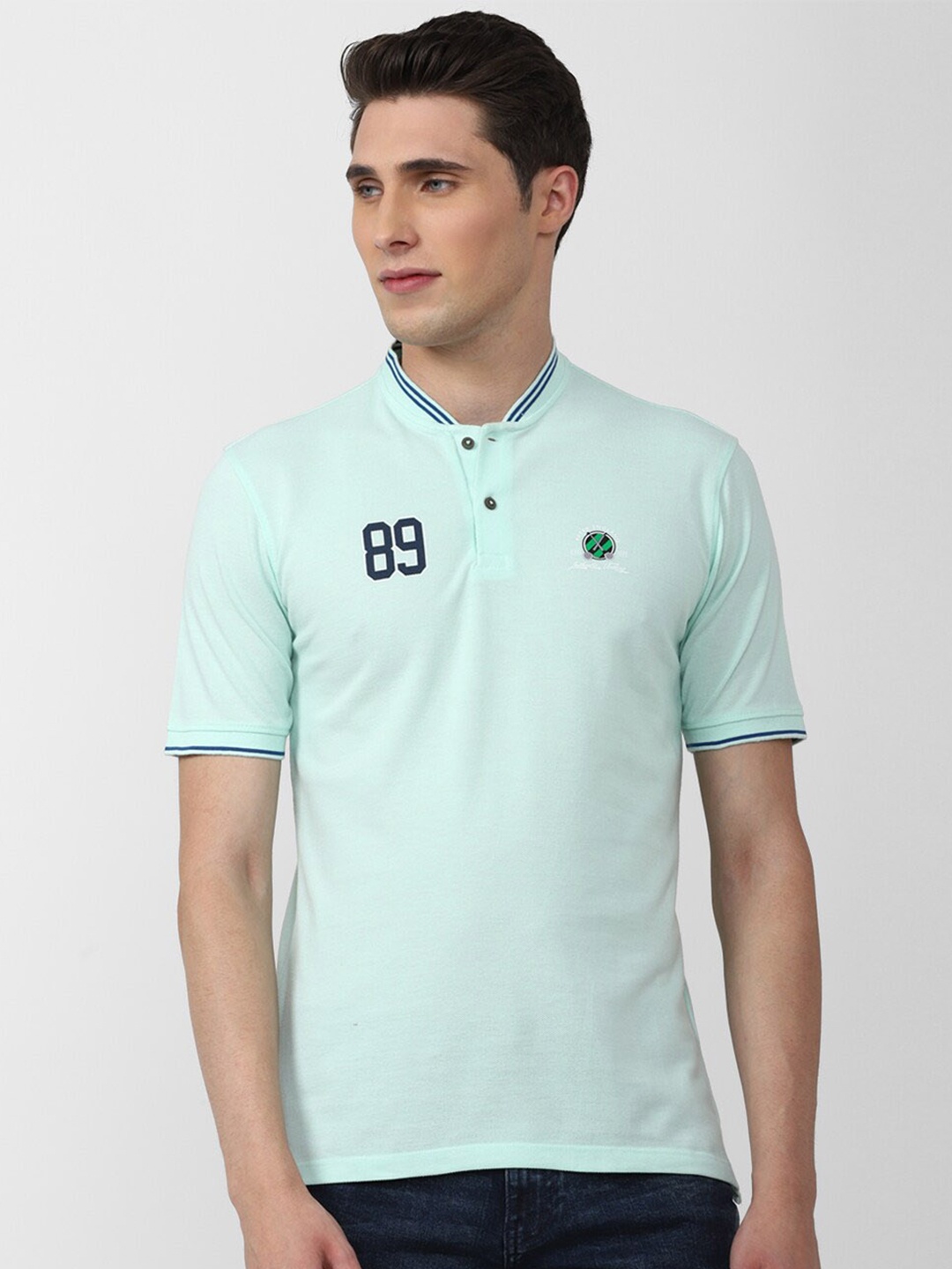 

Peter England Casuals Men Solid Henley Neck T-shirt, Sea green