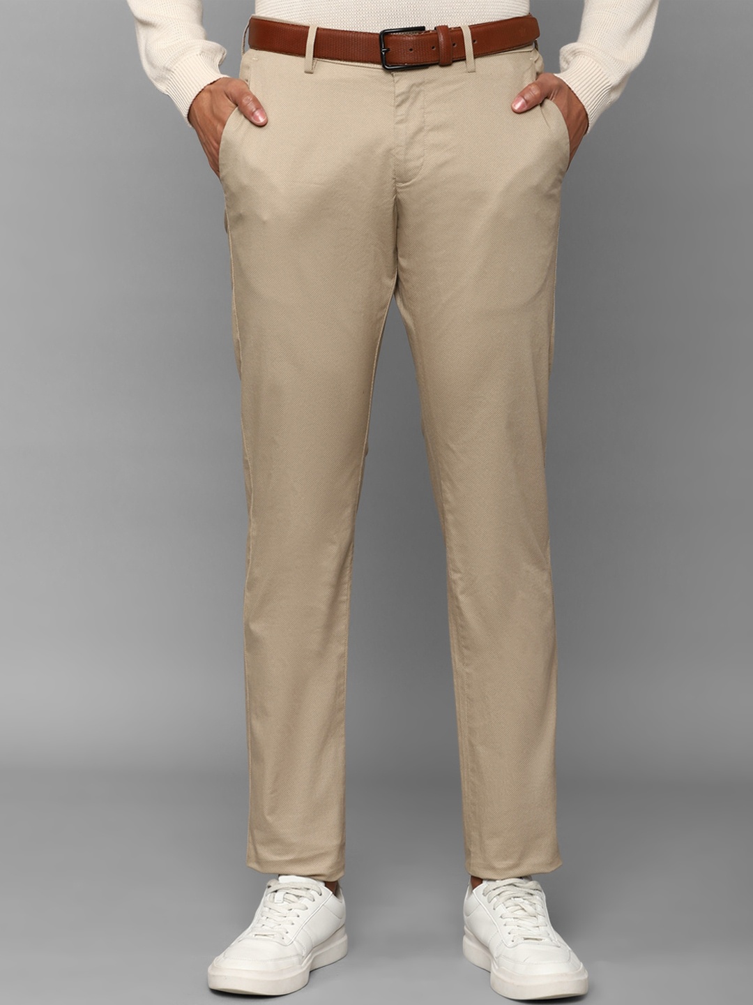 

Allen Solly Sport Men Textured Slim Fit Trousers, Beige