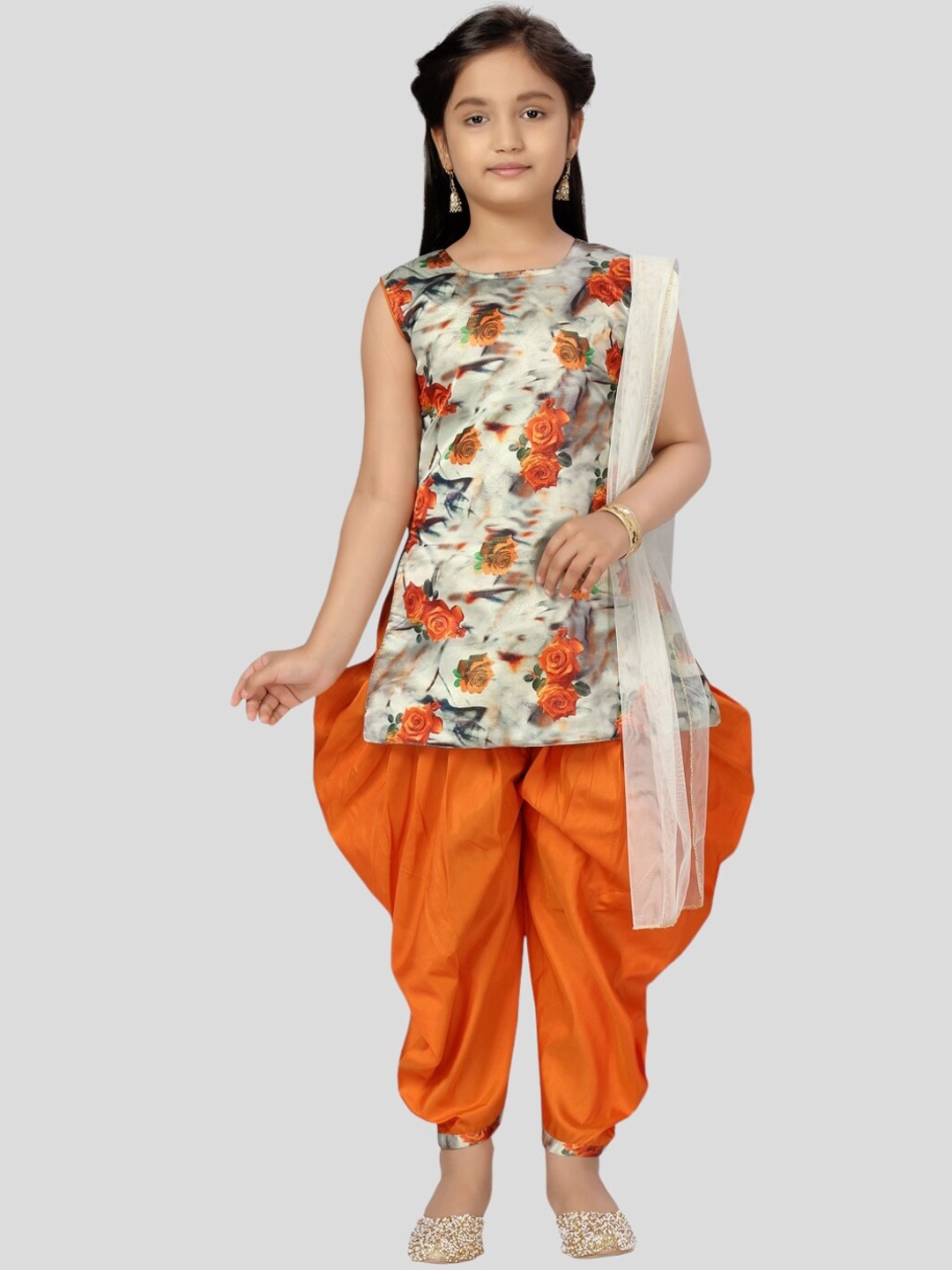 

Aarika Girls Floral Printed Pure Silk Kurti with Patiala, Orange