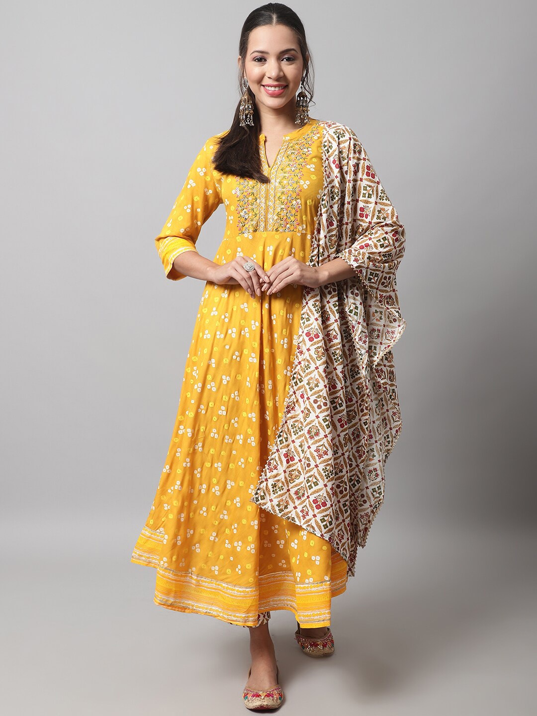 

KALINI Women Floral Embroidered Thread Work Kurta with Trousers & With Dupatta, Mustard