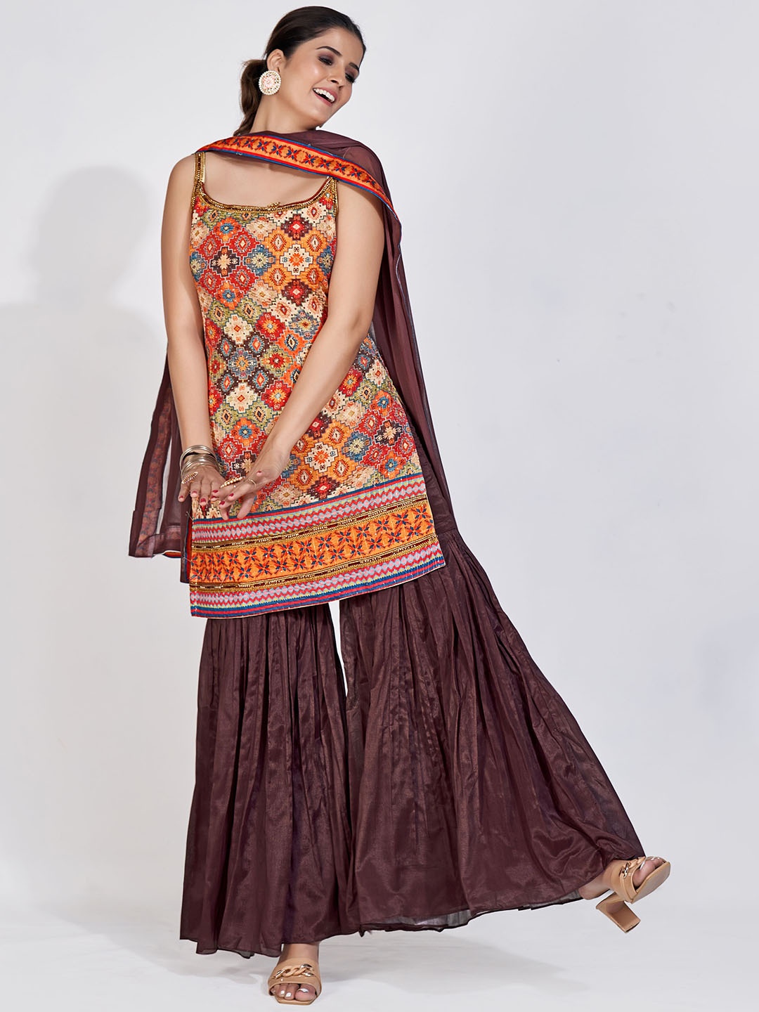 

DRESSTIVE Women Ethnic Motifs Printed Beads and Stones Kurti with Sharara & Dupatta, Beige