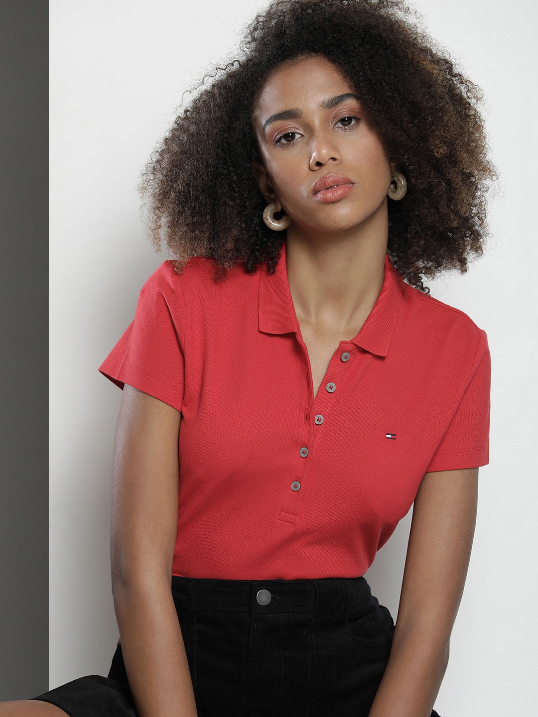 

Tommy Hilfiger Women Solid Polo Collar Slim Fit T-shirt, Red