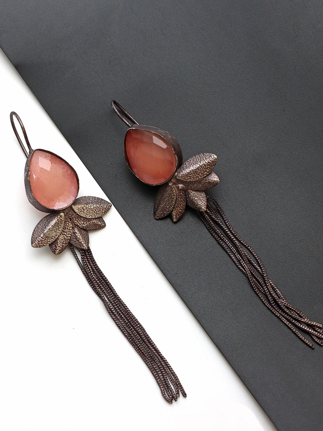 

Ozanoo Silver-Plated Teardrop Shaped Drop Earrings