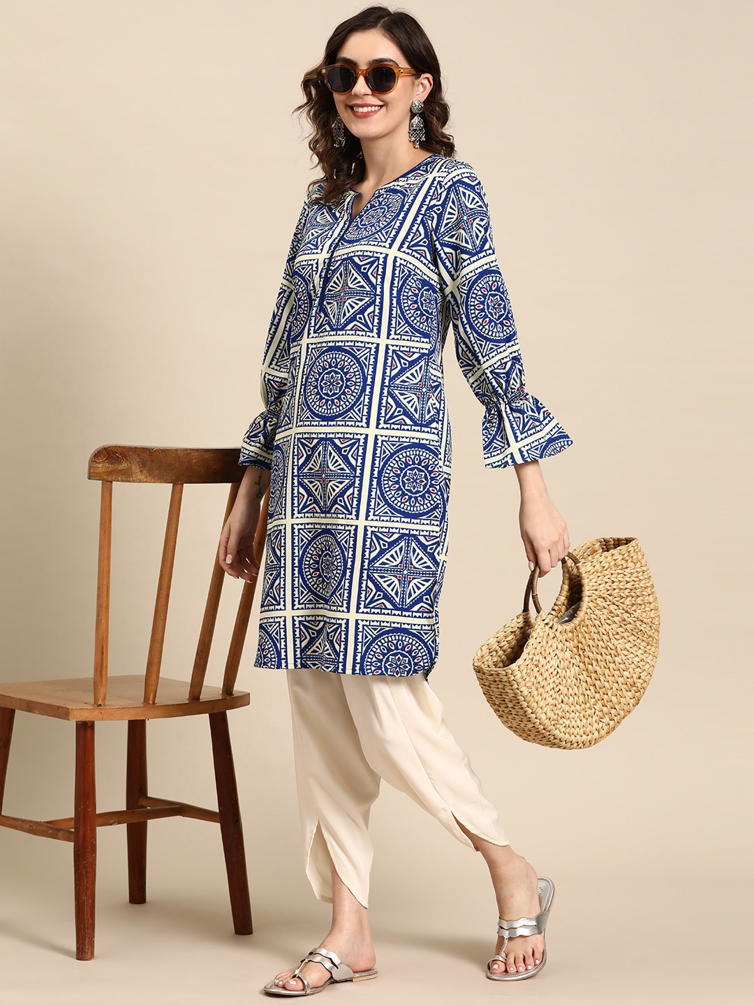 

Sangria Ethnic Motifs Printed Puff Sleeves Kurta with Dhoti Pants, Blue