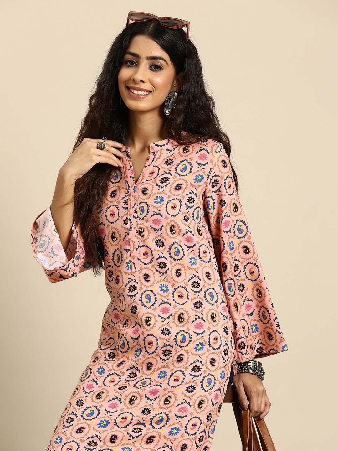 

Sangria Ethnic Motifs Printed Flared Sleeves Kurta, Pink