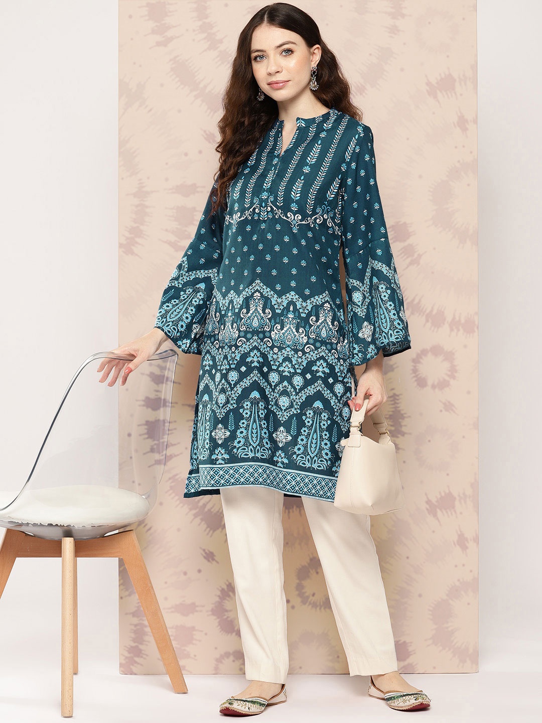 

Sangria Women Ethnic Motifs Printed Flared Sleeves Straight Kurta, Blue