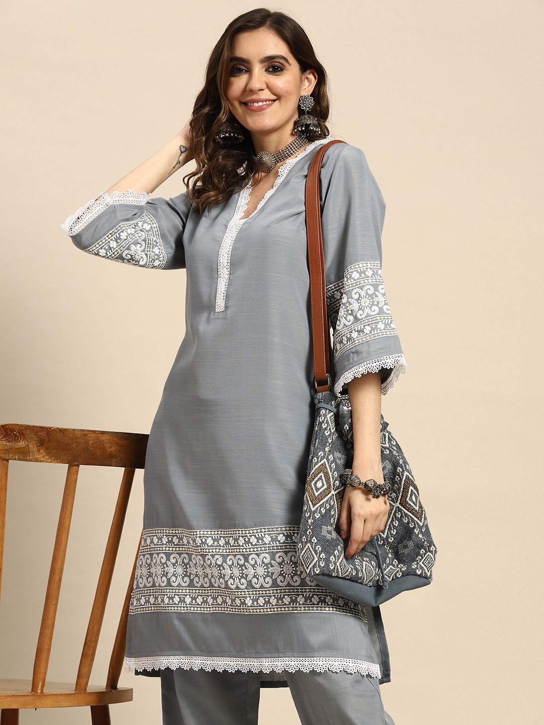 

Sangria Women Ethnic Motifs Thread Work Kurta with Trousers, Grey