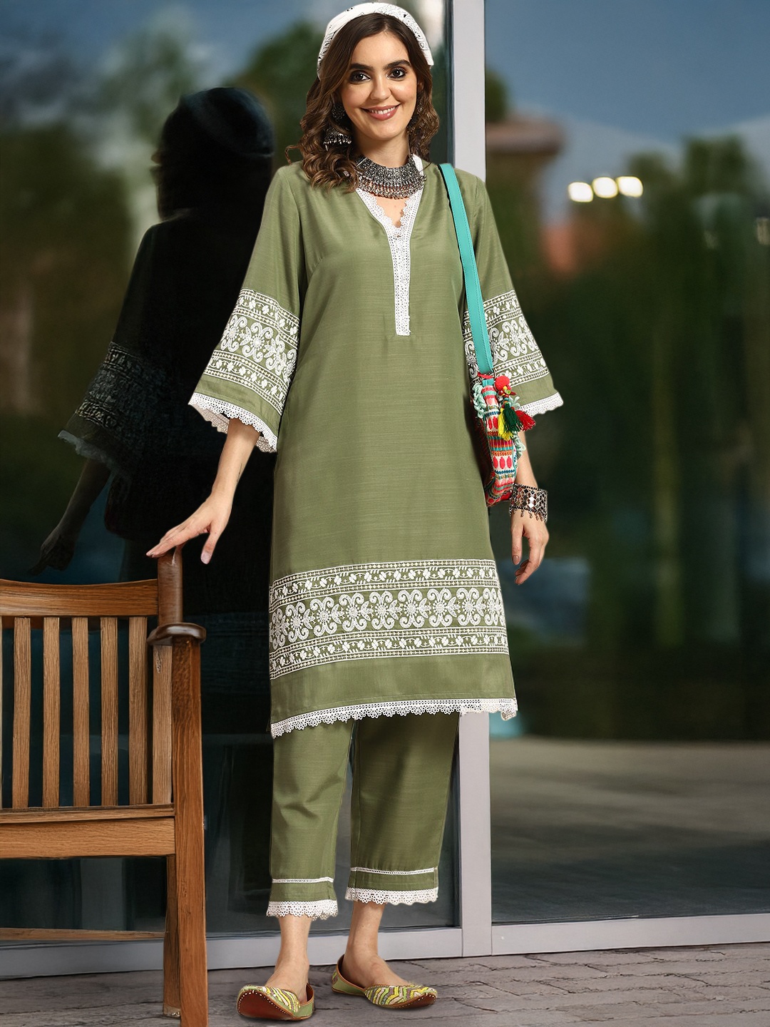 

Sangria Women Ethnic Motifs Thread Work Kurta with Trousers, Olive