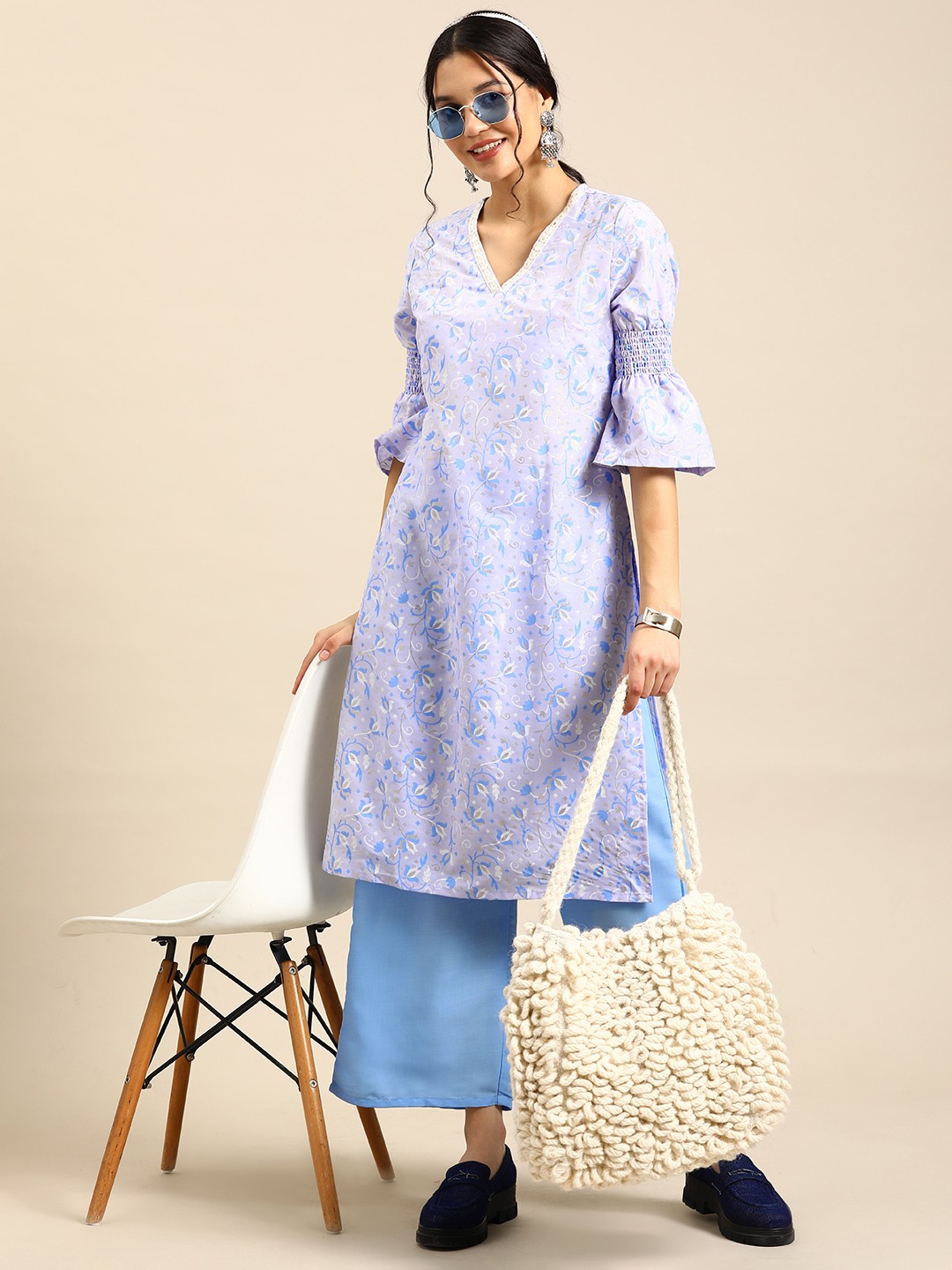 

Sangria Foil Ethnic Print Mirror Work Detailed Straight Kurta with Palazzos, Blue
