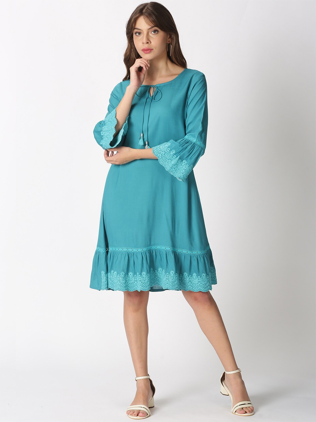 

Saffron Threads Woman Solid Dress with Lace Embroidered Details, Turquoise blue