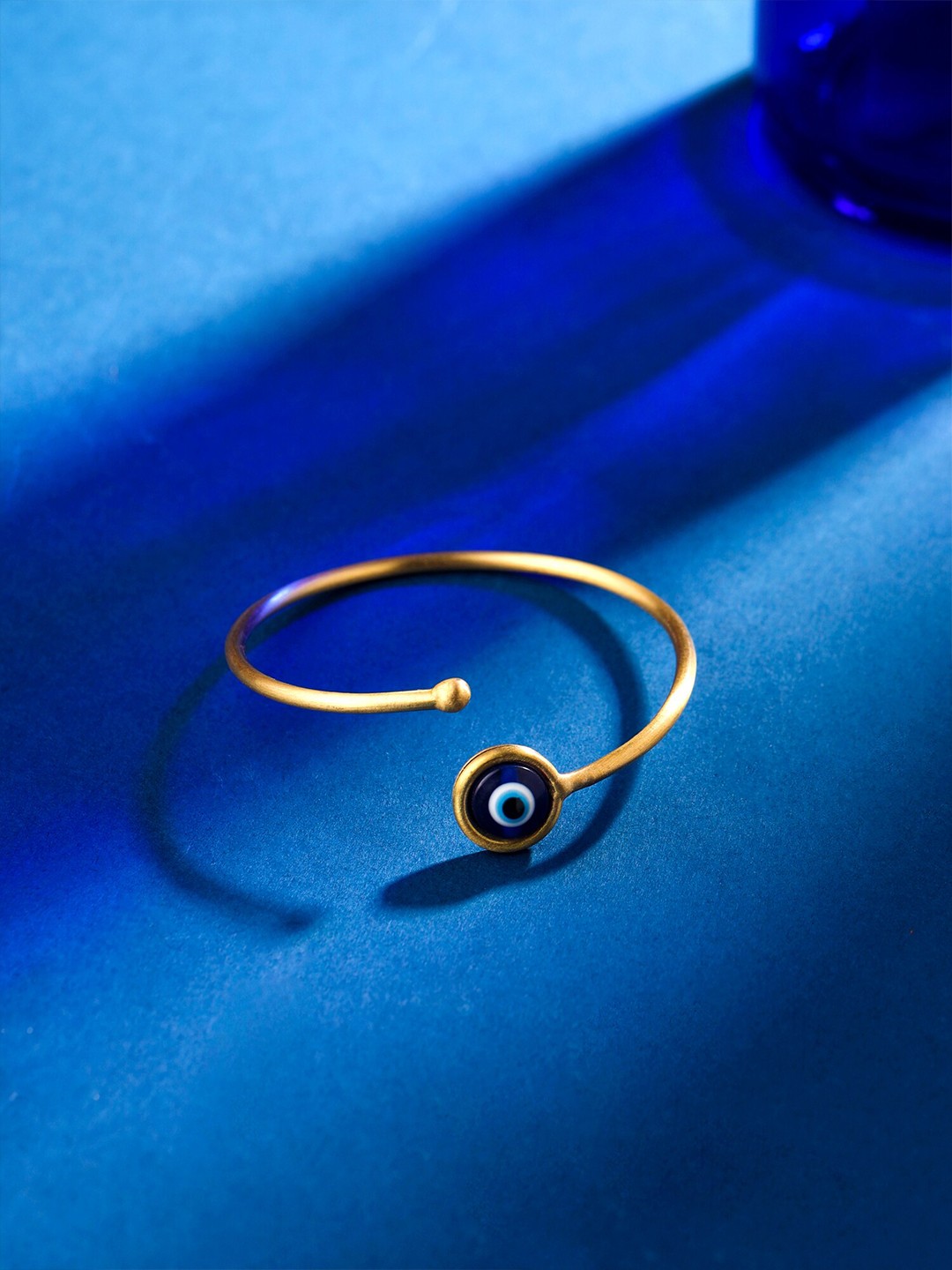 

Yellow Chimes Women Gold-Plated Wraparound Bracelet, Blue