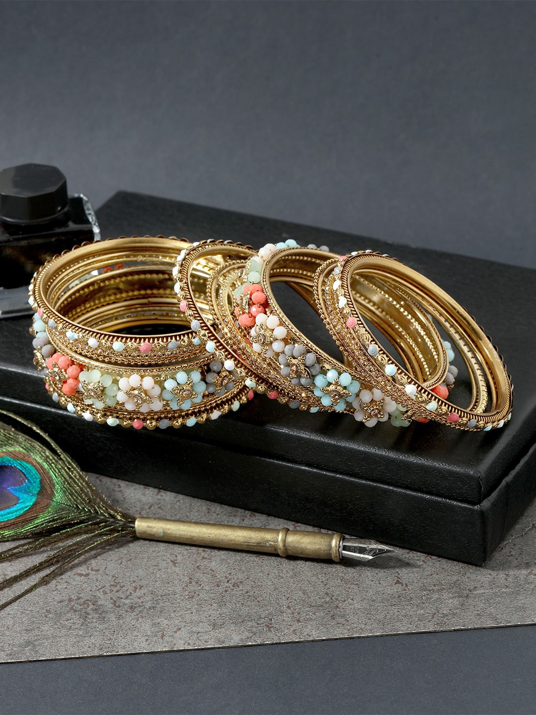 

AccessHer Set Of 9 Gold-Plated Stone Studded Bangles Set