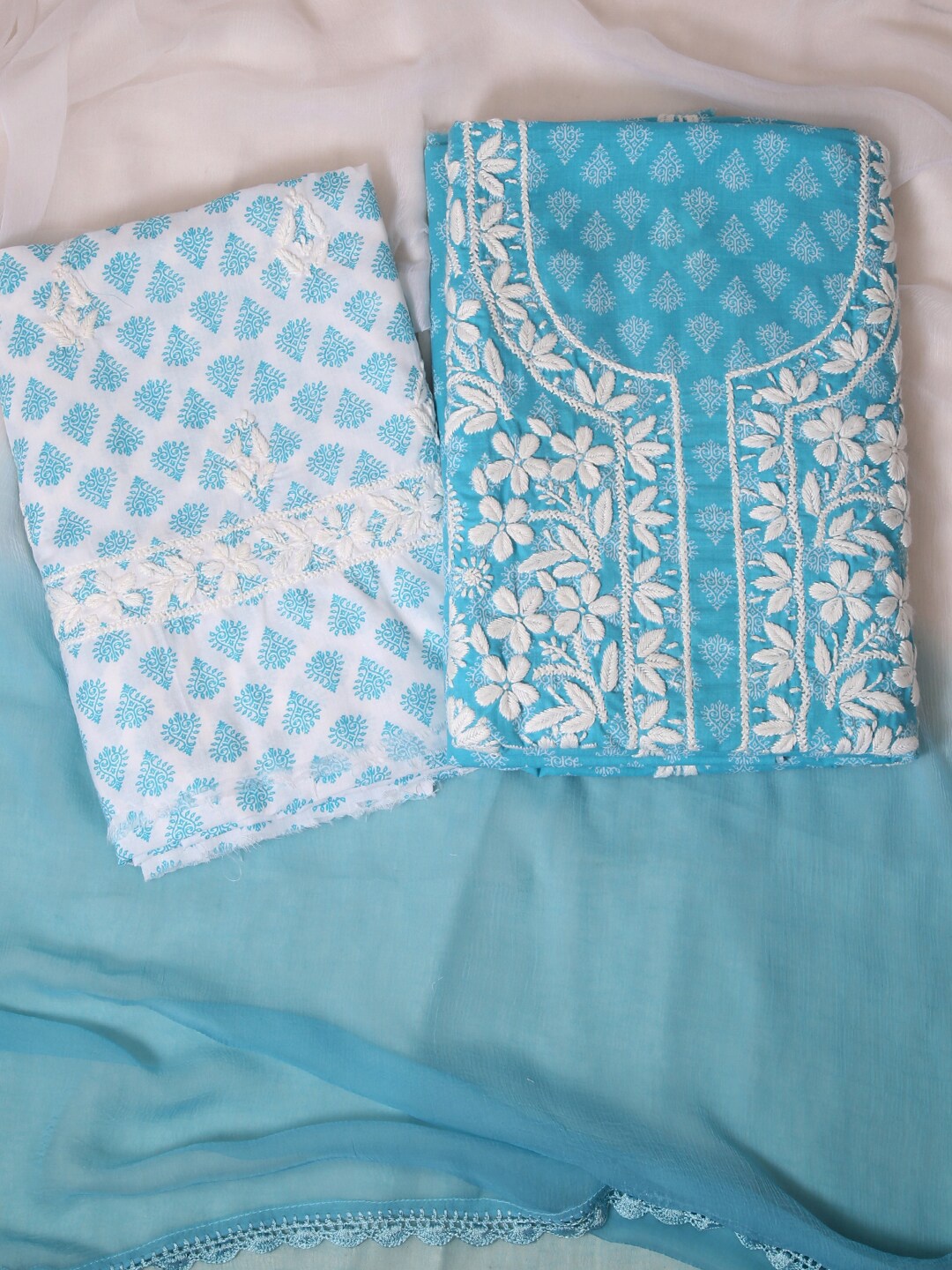 

ADA Blue & White Embroidered Unstitched Dress Material