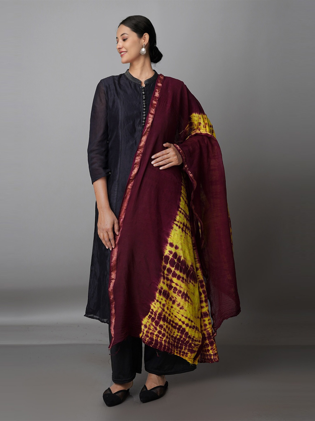 

Unnati Silks Purple & Yellow Dyed Pure Cotton Shibori Dupatta