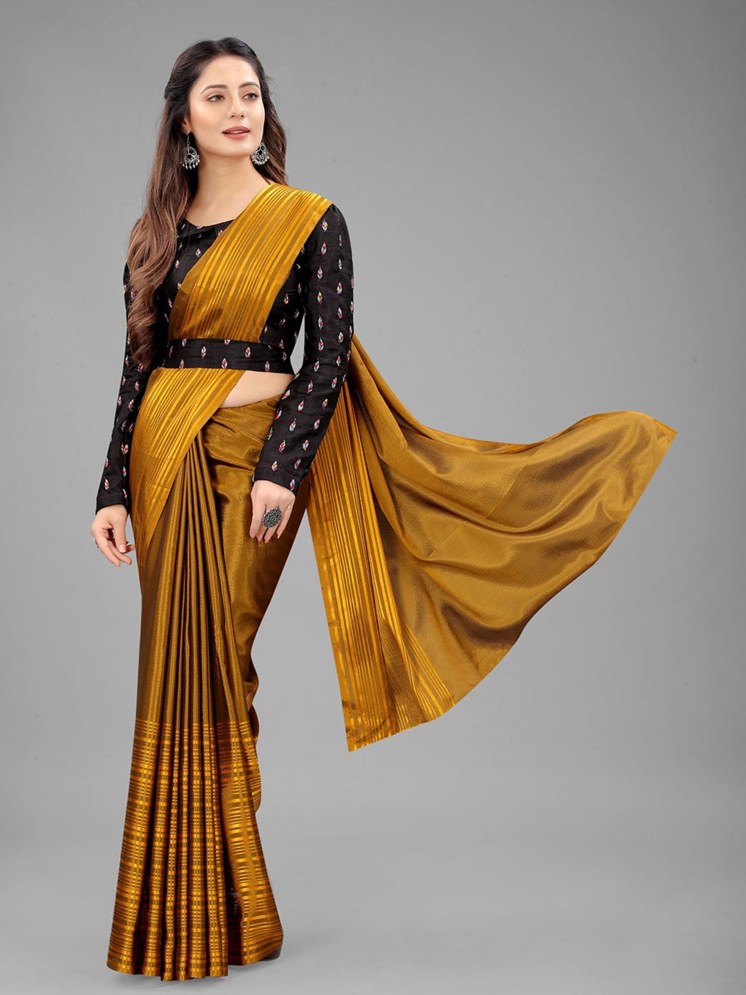 

Rangrasiya Corporation Striped Satin Ikat Saree, Mustard