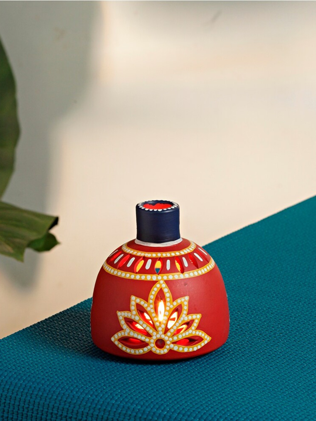 

Aapno Rajasthan Red & Yellow Printed Candle Holder